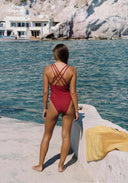 Red one-piece swimsuit with crisscross back straps