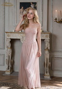 Blush pink lace corset gown with spaghetti straps and flowing ankle-length skirt