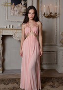 Pink halter gown with embellished neckline and gathered pleated skirt