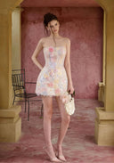 Fleur de Minuit mini dress with spaghetti straps, fitted bodice, floral lace trim