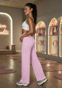 High-waisted straight-leg yoga pants in light pink, side view of wide-leg silhouette