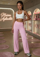 High-waisted straight-leg yoga pants in light pink, front view with long straight legs