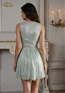 Mint green satin sleeveless dress with V-neck and beaded waist embellishment
