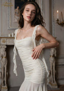 Ruched satin slip dress with spaghetti straps, cowl neckline, side drape detail