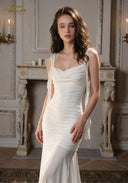 Ruched satin slip dress with spaghetti straps and cowl neckline, fitted long skirt