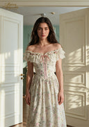Cream floral off-shoulder dress with lace edging, pink ribbon front and gathered bodice
