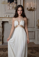 Star of Crystal Gown in white, front view with gold beaded bodice and pleated tiered skirt
