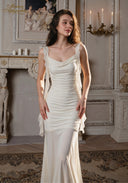 Ruched satin slip dress with spaghetti straps, cowl neckline, side drape and long hem