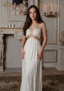 Star of Crystal Gown in white, halter bodice with gold beadwork and long tiered maxi skirt