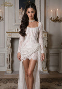 White lace dress with square neckline, long sheer sleeves, ruched bodice, layered sheer hem.