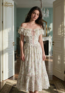 Cream floral off-shoulder dress with pink ribbon tie, lace hem and full tiered skirt