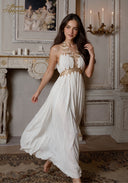 Star of Crystal Gown in white, sleeveless halter with gold beadwork and draped tiered hem