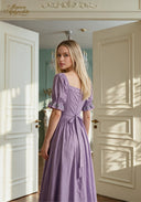 Lilac puff-sleeve midi dress with square neckline, lace-up bodice, and tied waist