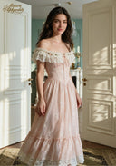 Blush embroidered off-shoulder gown with corset waist and tiered lace-edged skirt