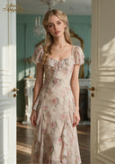 Floral print dress with puff sleeves, ruffled neckline, and layered tiered hem