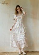 Floral tiered midi dress with puff sleeves and cinched waist, square neckline