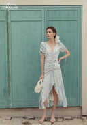 Blue Celeste floral dress with V-neck and asymmetrical midi hem with side slit