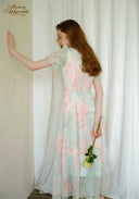Pastel floral dress with lace-trim shoulders and flowing tiered skirt