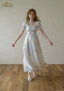Floral satin midi dress with puff sleeves and gathered waist, flowing skirt, silver sheen