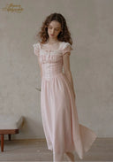 Light pink dotted midi dress with ruffled cap sleeves and gathered bodice