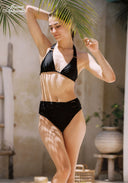 Black bikini set, triangle halter top and high-rise bottoms with front button