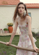 Parfum de Thé dress detail: spaghetti straps and layered pastel floral tiers
