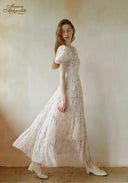 Floral tiered maxi dress with puff sleeves and cinched waist, square neckline