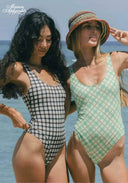 Two checkered one-piece swimsuits: one green, one black-and-white, scoop neckline.