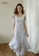 Lavender floral midi dress with square neckline and short puff sleeves, front view.
