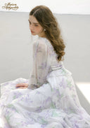Floral tiered midi dress with sheer sleeves and smocked waist panel