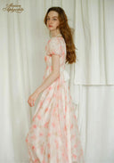 Sunset dress in light pink floral print, short puff sleeves, square neckline, maxi length