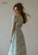 Light blue floral midi dress, off-shoulder straps detail at back, puff sleeves