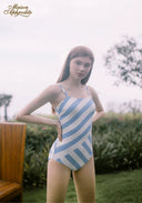 Blue-and-white striped one-piece swimsuit with thin straps, front view