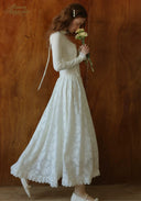 White lace ballet journal dress with long sleeves, off-shoulder neckline, full skirt