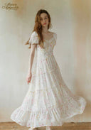 Floral tiered maxi dress with short puff sleeves and gathered tiered skirt