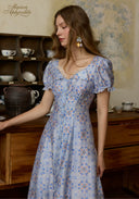 Light blue floral midi dress with lace-trim square neckline and puff sleeves, close side
