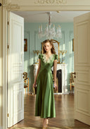 Green satin long dress with lace sleeves and fitted bodice
