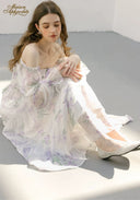 Floral tiered midi dress with square neckline and full gathered skirt