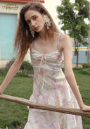 Parfum de Thé dress with spaghetti straps and pastel floral tiered skirt