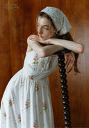 Secret Garden dress in white with floral print, tiered bodice and skirt; bonnet