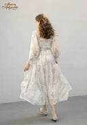Floral tiered midi dress with ruched back yoke and long sheer sleeves