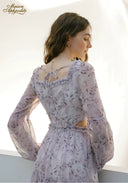 Lilac floral midi dress back view with open shoulder cutout and tie strap detail