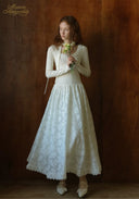 White lace ballet journal dress with long fitted sleeves and full gathered skirt
