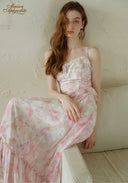 Light pink floral sundress with lace-trim bodice, spaghetti straps, tiered ruffle skirt