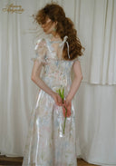 Floral satin midi dress with puff sleeves and tie straps, gathered waist, silver sheen