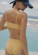 Yellow patterned bikini set back view with string-tie bandeau top and high-rise briefs