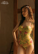 Yellow floral vintage one-piece swimsuit with sweetheart neckline and bow straps