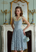 Light blue sleeveless lace patchwork dress with V-neck trim and flared skirt