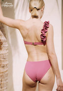 Pink asymmetrical bikini set back view with ruffled strap and high-cut briefs