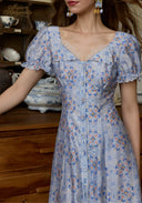 Light blue floral dress bodice with lace trim square neckline and puff sleeves